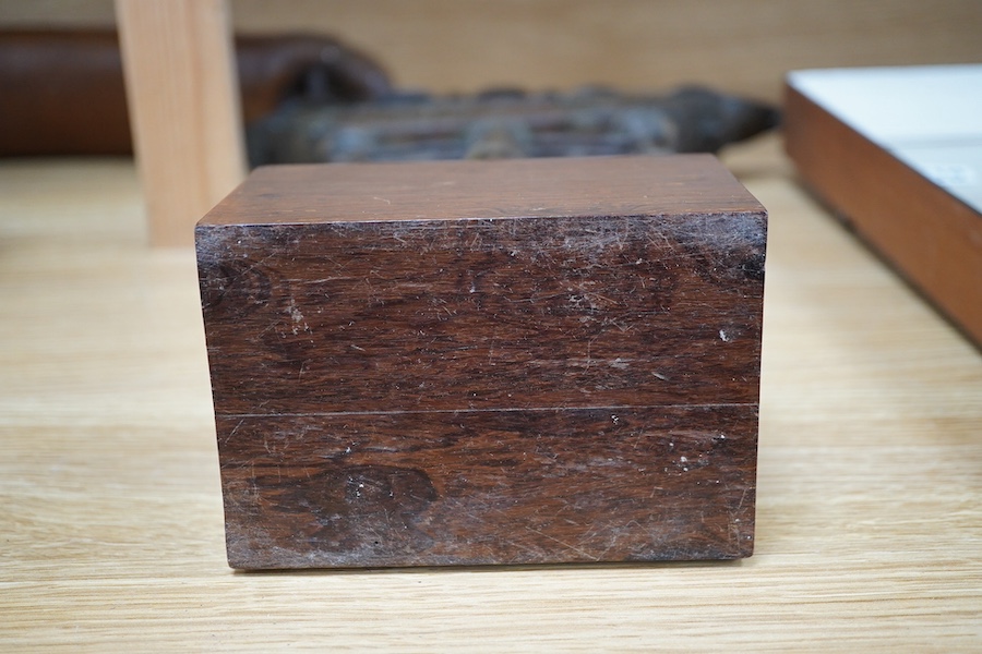 An 18th/19th century Indian Buddhist bronze oil lamp, on a later wood stand, 42.5cm high. Condition - fair